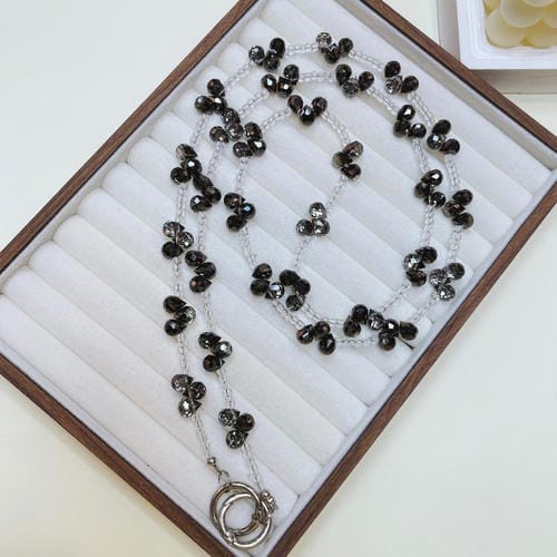 Cristal en forma de gota que cruza la cadena del teléfono (negro)